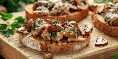 Bruschetta met bospaddenstoelen en boter op knapperig brood – Krambals snack